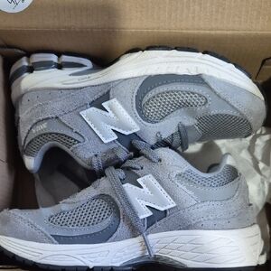 New Balance Kids Gray and White Sneakers